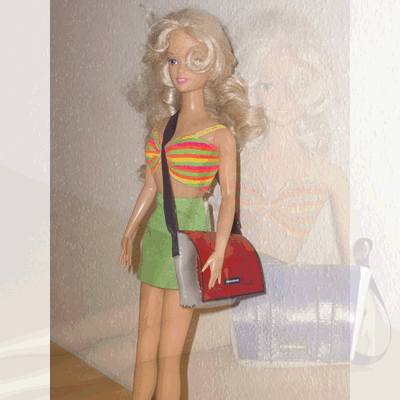 Barbie presenting messenger bags
